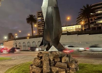 image of large origami penguin sculpture made out of steel