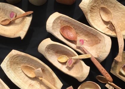 A flat lay of different wood carved spoons. 