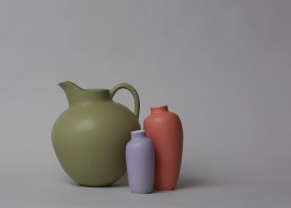 photo of one water jug and two smaller vases
