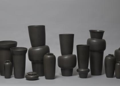 photo of a row of ceramic vessles